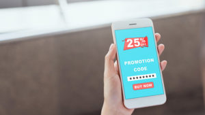 woman using a promotion code on a mobile device | lead capture forms