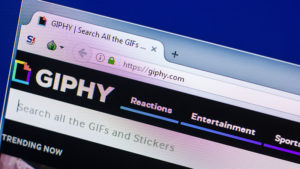 Homepage of Giphy website on the display of PC | marketing images